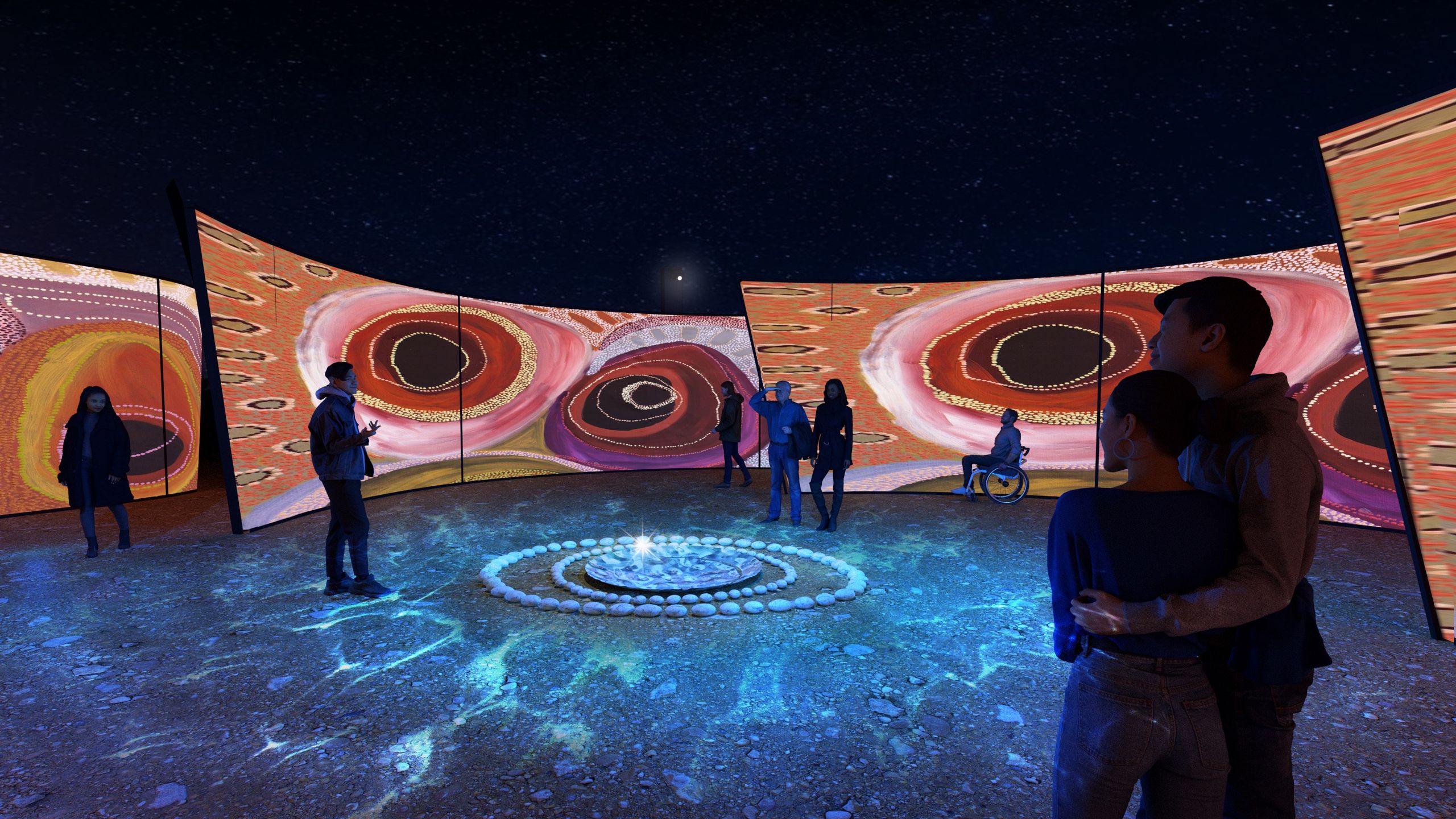 People observing a circular digital art installation with swirling patterns on large screens and glowing stones on the ground, under a starry sky.