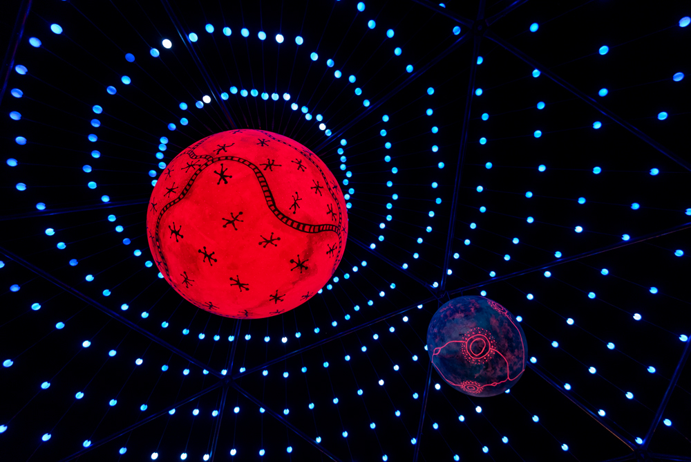 Red and blue ball in the sky